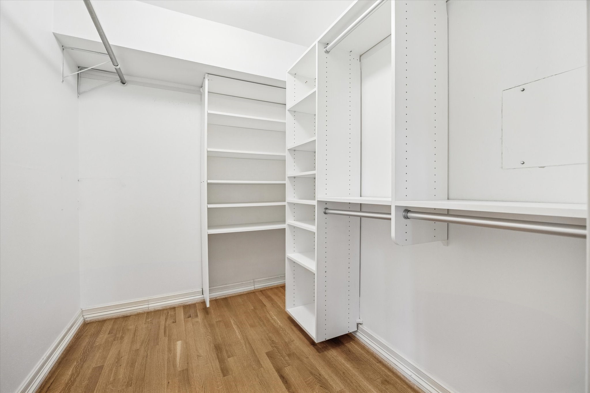 449 North Post Oak Lane, Unit 449 Houston, TX 77024 - Photo 12 of 18 Walk-in closet in primary bedroom.