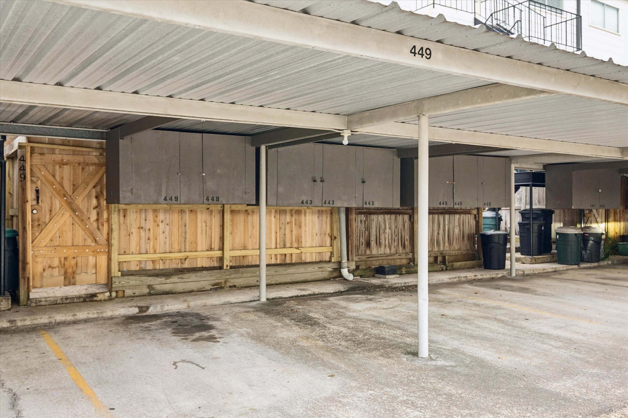 449 North Post Oak Lane, Unit 449 Houston, TX 77024 - Photo 15 of 18 One carport covered parking space.