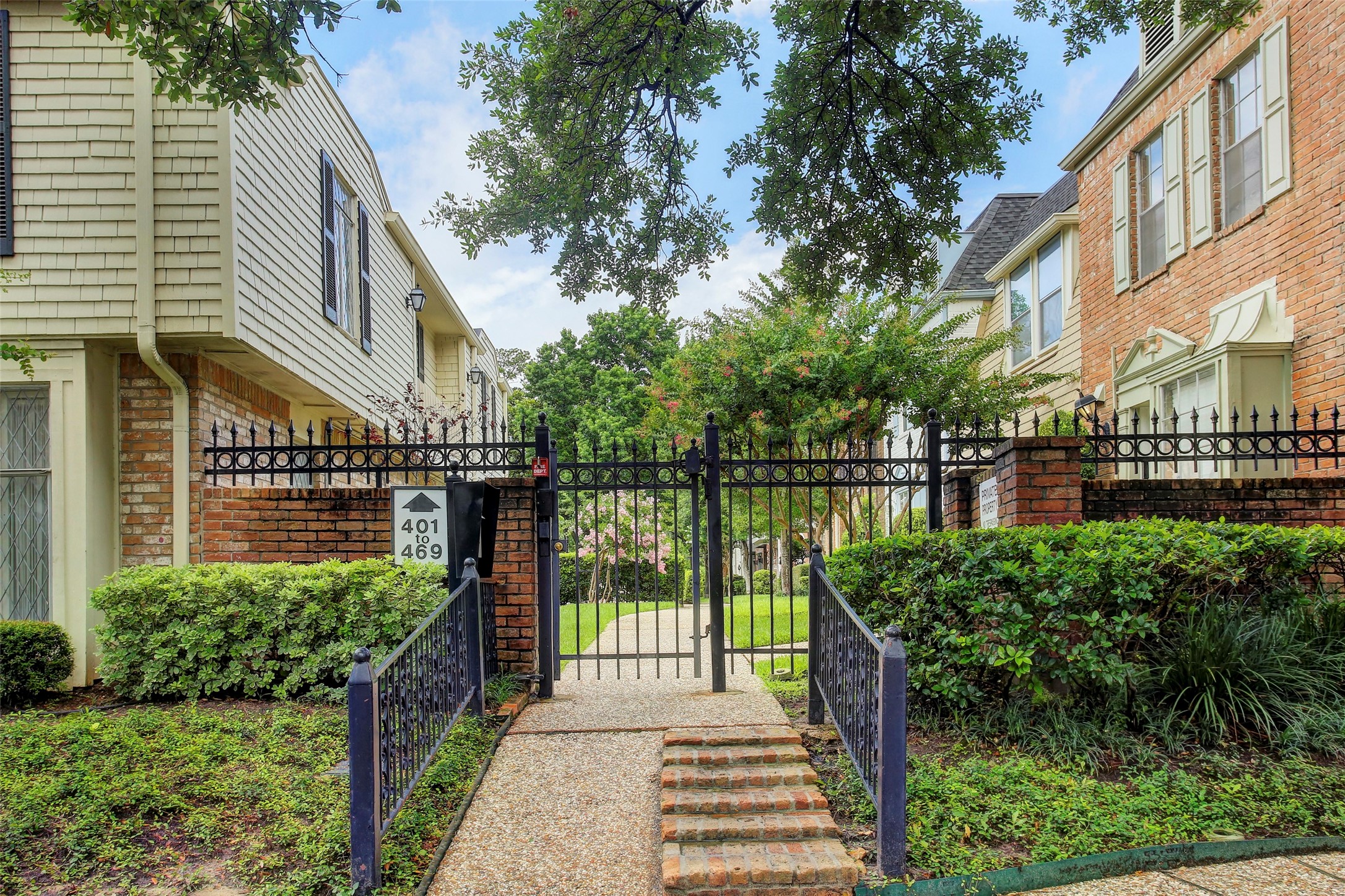 449 North Post Oak Lane, Unit 449 Houston, TX 77024 - Photo 16 of 18 Controlled access pedestrian gate entrance to 449 North Post Oak Lane.