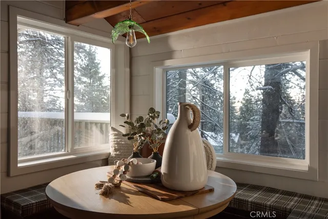 a vase of flowers sitting on a table