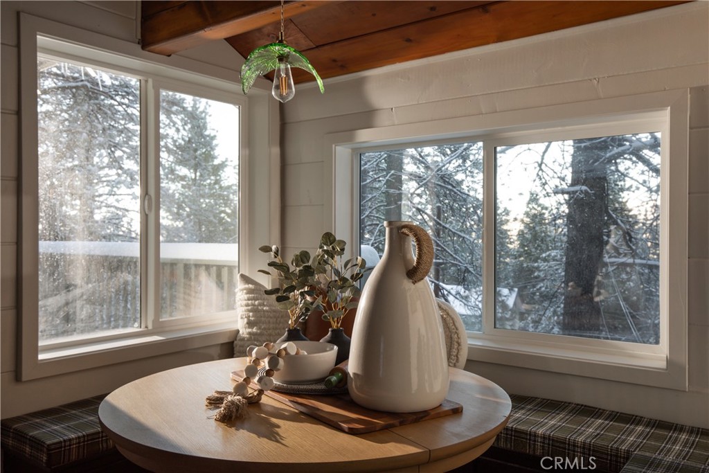 a vase of flowers sitting on a table