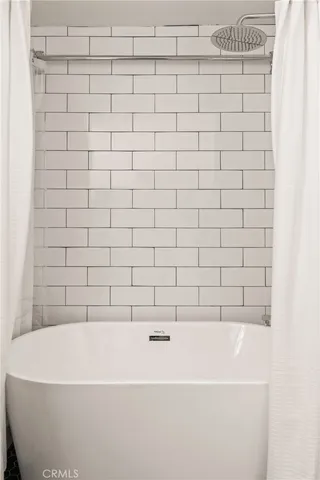 a bathroom with a bathtub