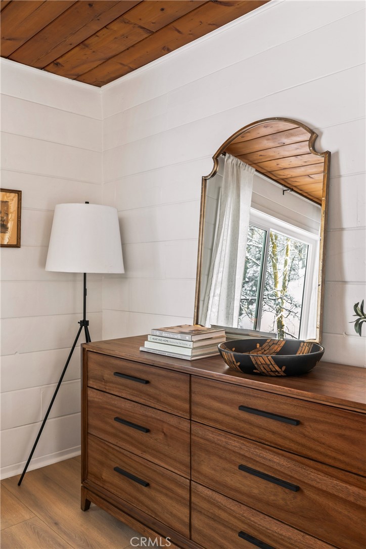1149 Scenic Way Twin Peaks, CA 92391 - Photo 23 of 31 a view of room with window and wooden floor