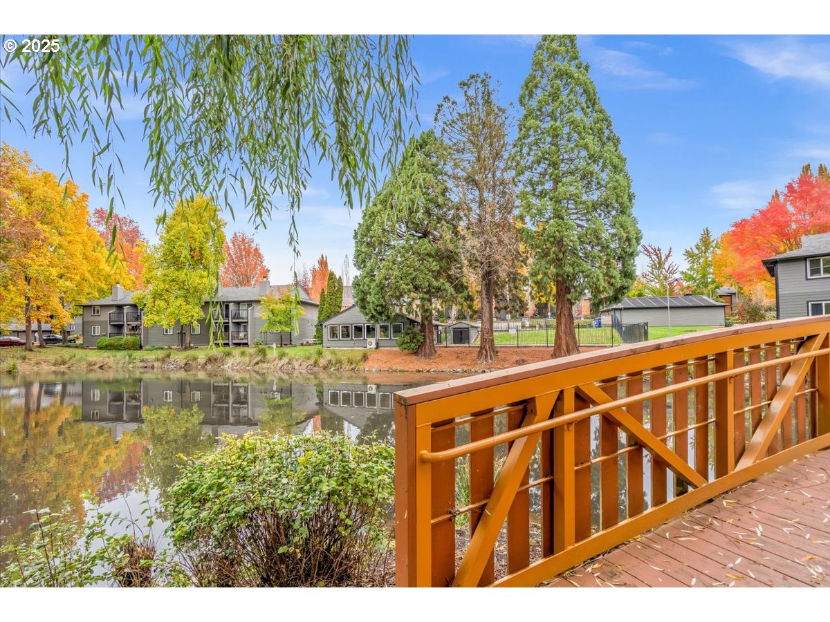 12612 Northwest Barnes Road, Unit 6 Portland, OR 97229 - Photo 33 of 40 a view of swimming pool with outdoor seating and plants