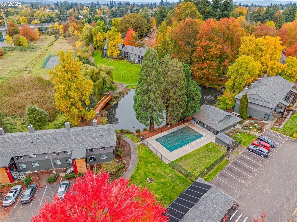 12612 Northwest Barnes Road, Unit 6 Portland, OR 97229 - Photo 40 of 40 an aerial view of a house with swimming pool garden and patio