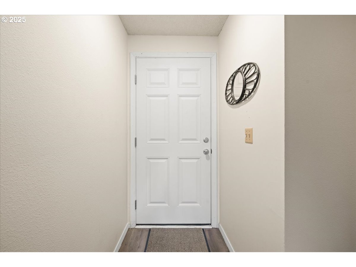 12612 Northwest Barnes Road, Unit 6 Portland, OR 97229 - Photo 4 of 40 a view of a entryway door
