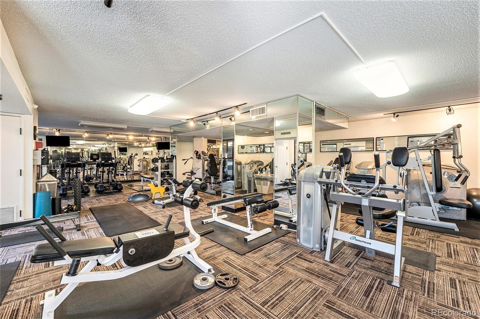 1020 15th Street, Unit 35L Denver, CO 80202 - Photo 25 of 39 a view of a room with gym equipment