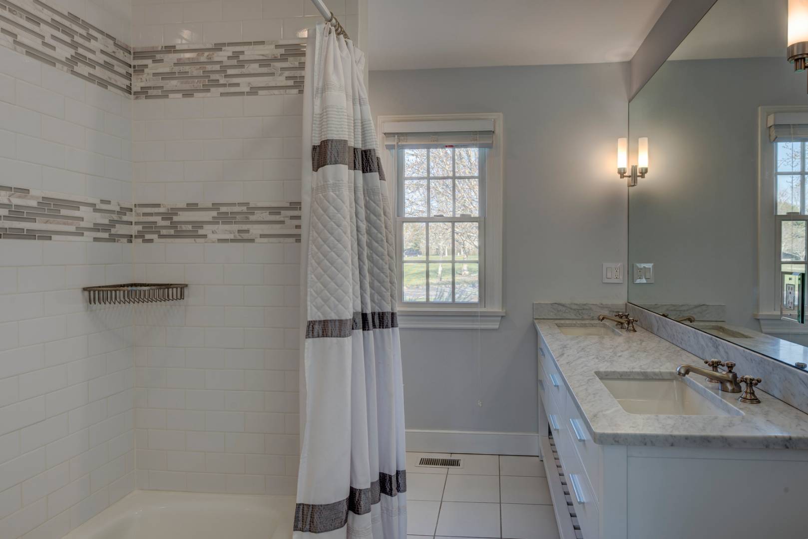 14 Aelfie's Way Bridgehampton, NY 11932 - Photo 10 of 13 a bathroom with a sink and a mirror