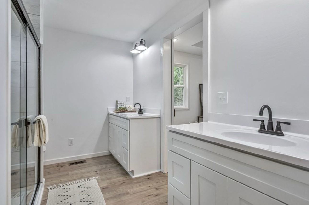 10498 Missionary Ridge Road Bon Aqua, TN 37025 - Photo 25 of 41 a bathroom with a sink and mirror