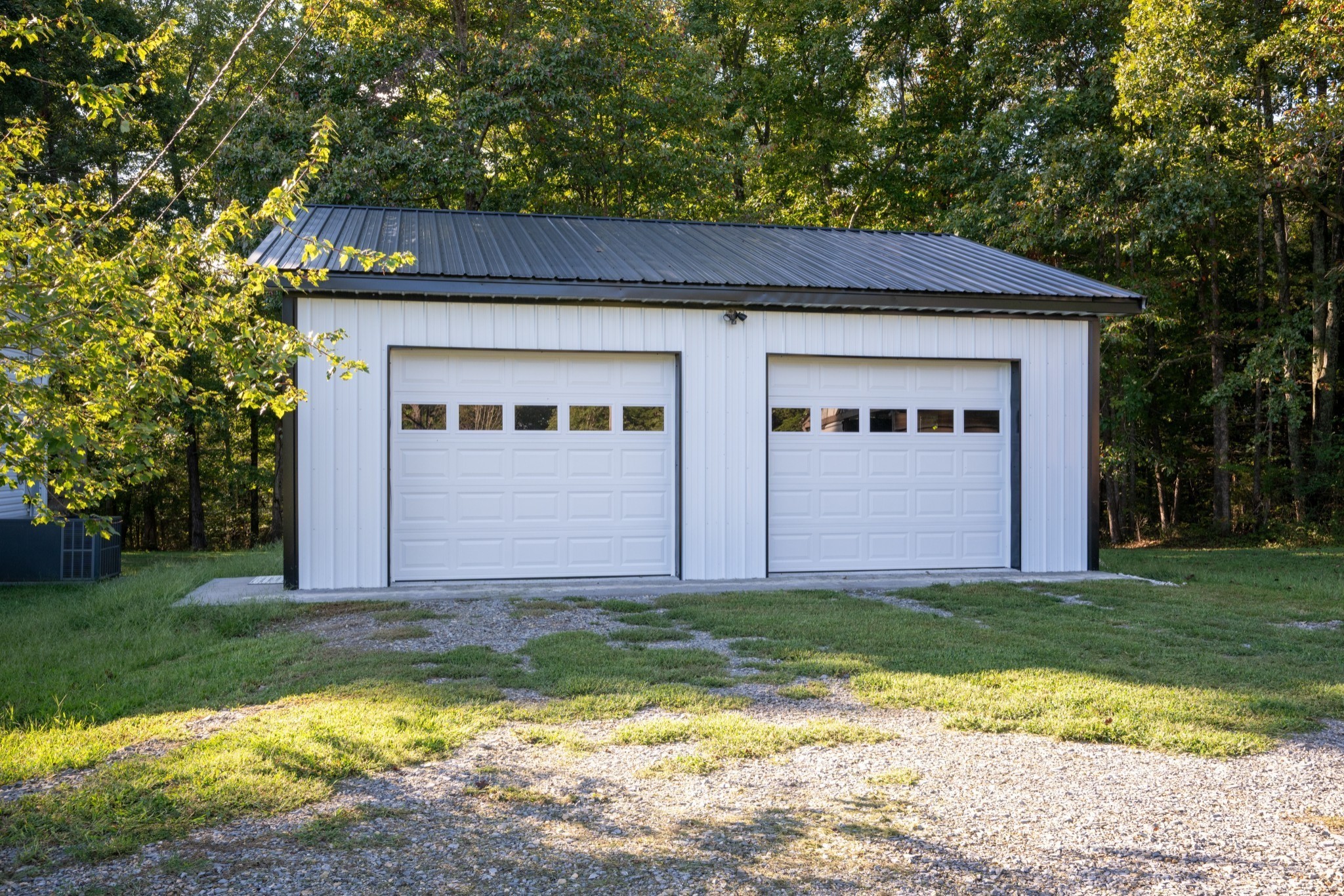 10498 Missionary Ridge Road Bon Aqua, TN 37025 - Photo 3 of 41 a view of a house with backyard and trees