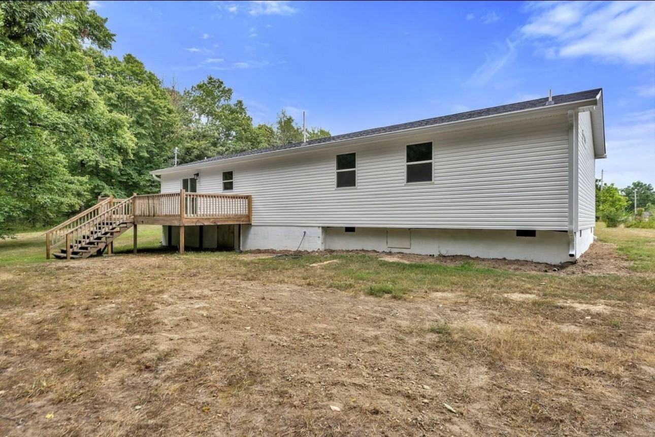 10498 Missionary Ridge Road Bon Aqua, TN 37025 - Photo 31 of 41 a house view with a backyard space