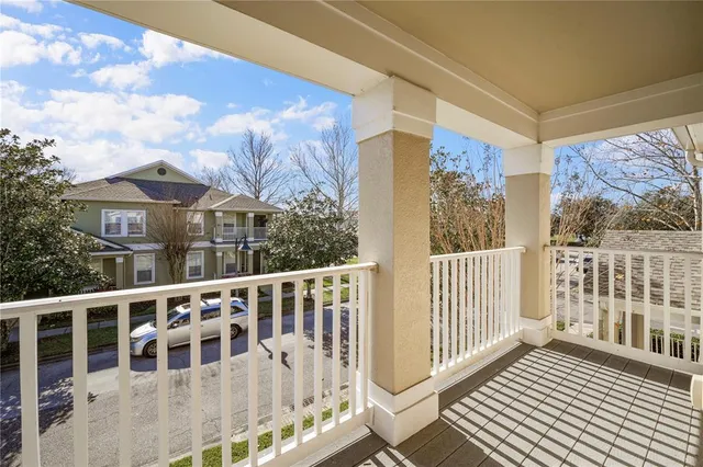 a view of a large building with a balcony