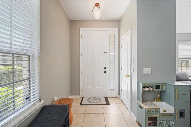 a room with a bed and a window