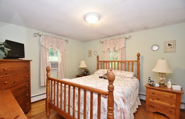 25 Grace Road Woburn, MA 01801 - Photo 7 of 14 a bed room with a bed and a television
