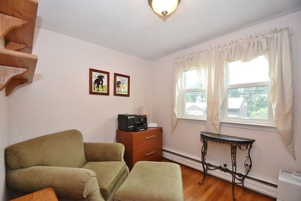 25 Grace Road Woburn, MA 01801 - Photo 10 of 14 a living room with furniture and a window