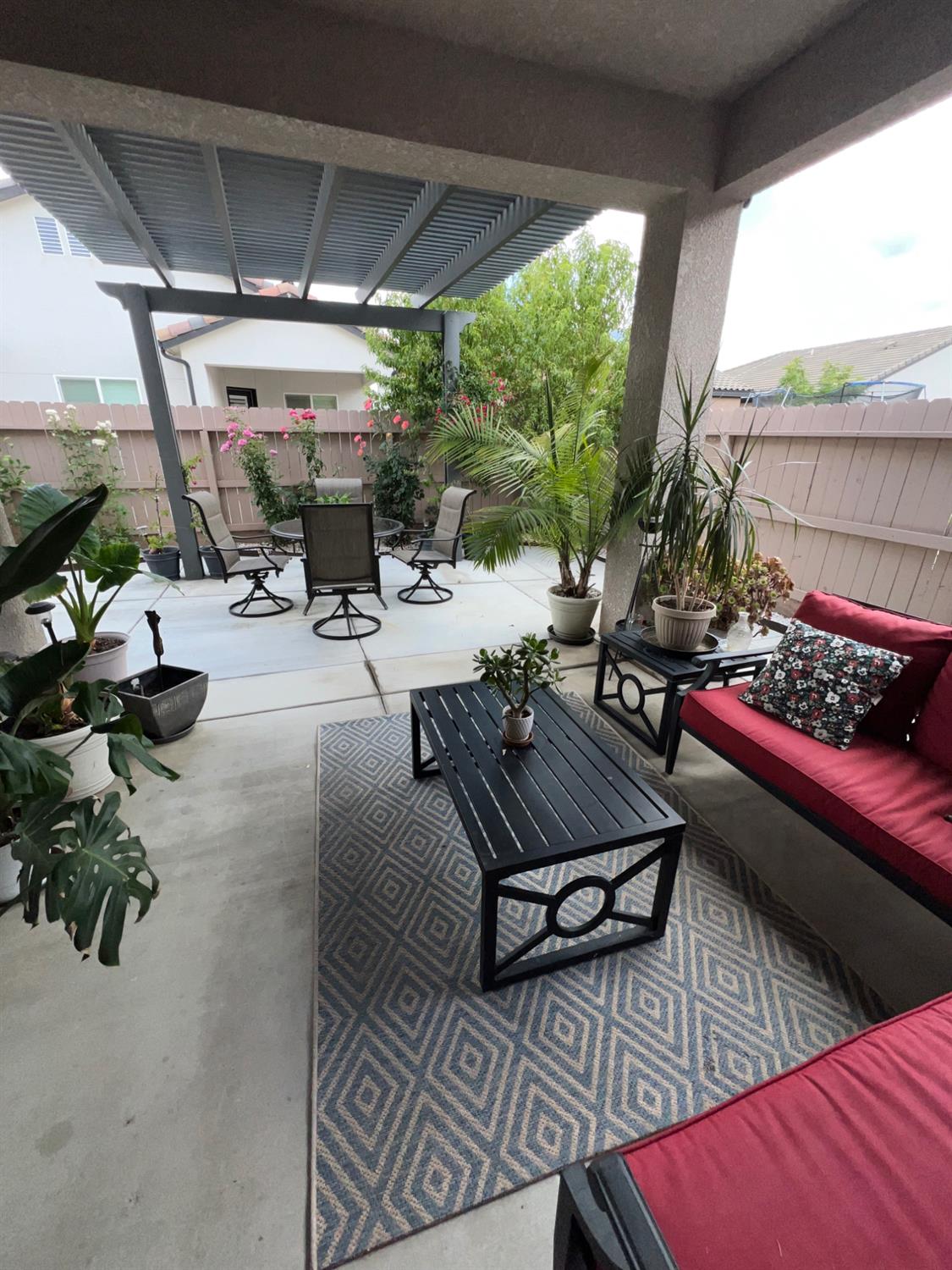 889 Coloma Place Madera, CA 93637 - Photo 45 of 61 a outdoor space with lots of furniture and a couch