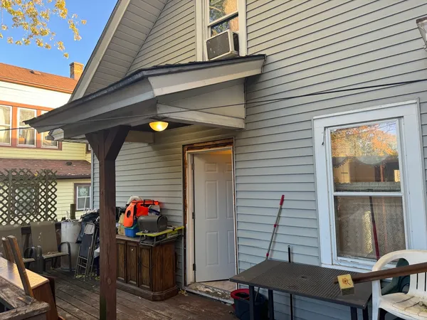 a view of a back yard of the house