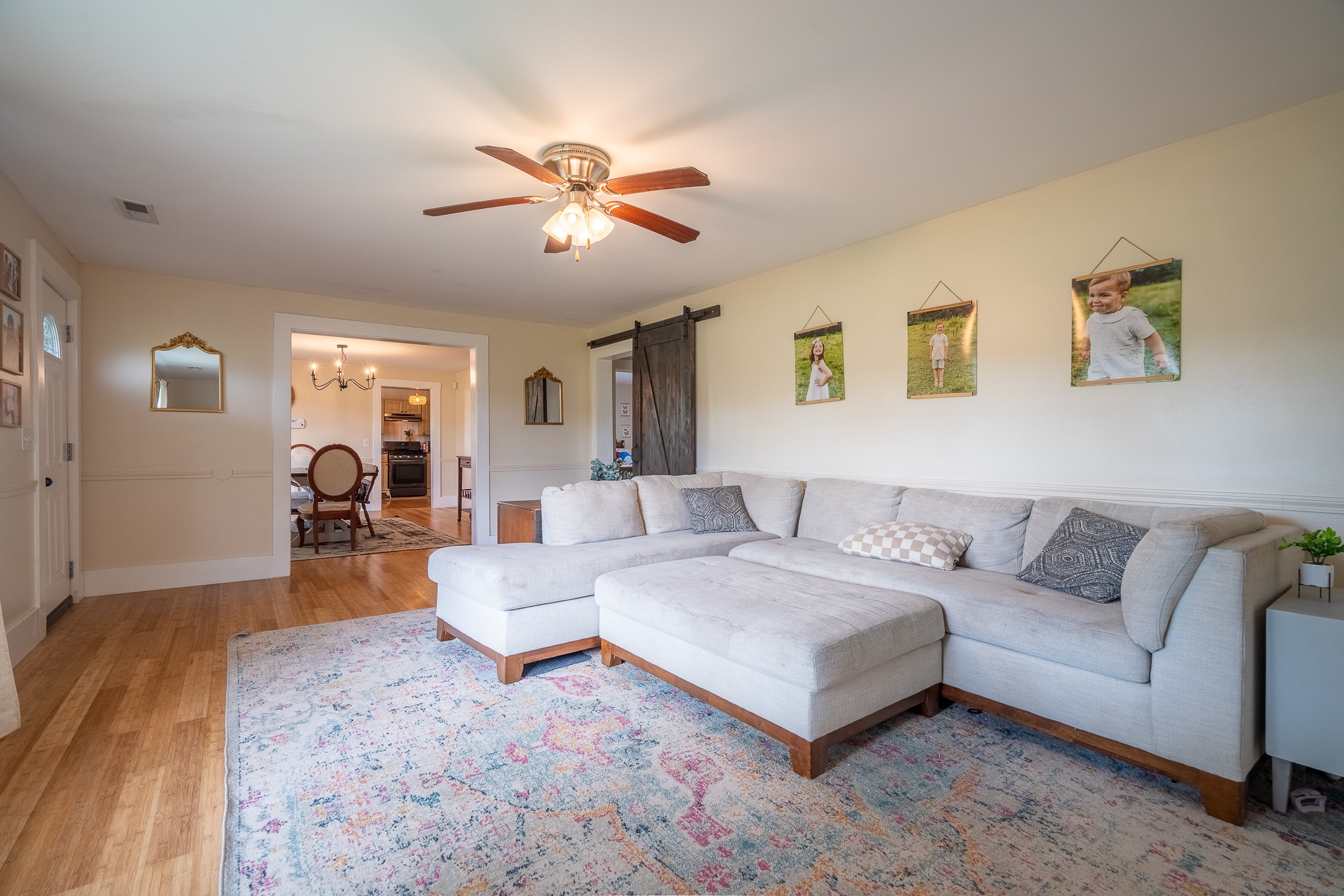 231 Rabbit Trail Road Leoma, TN 38468 - Photo 11 of 37 a living room with furniture and a chandelier