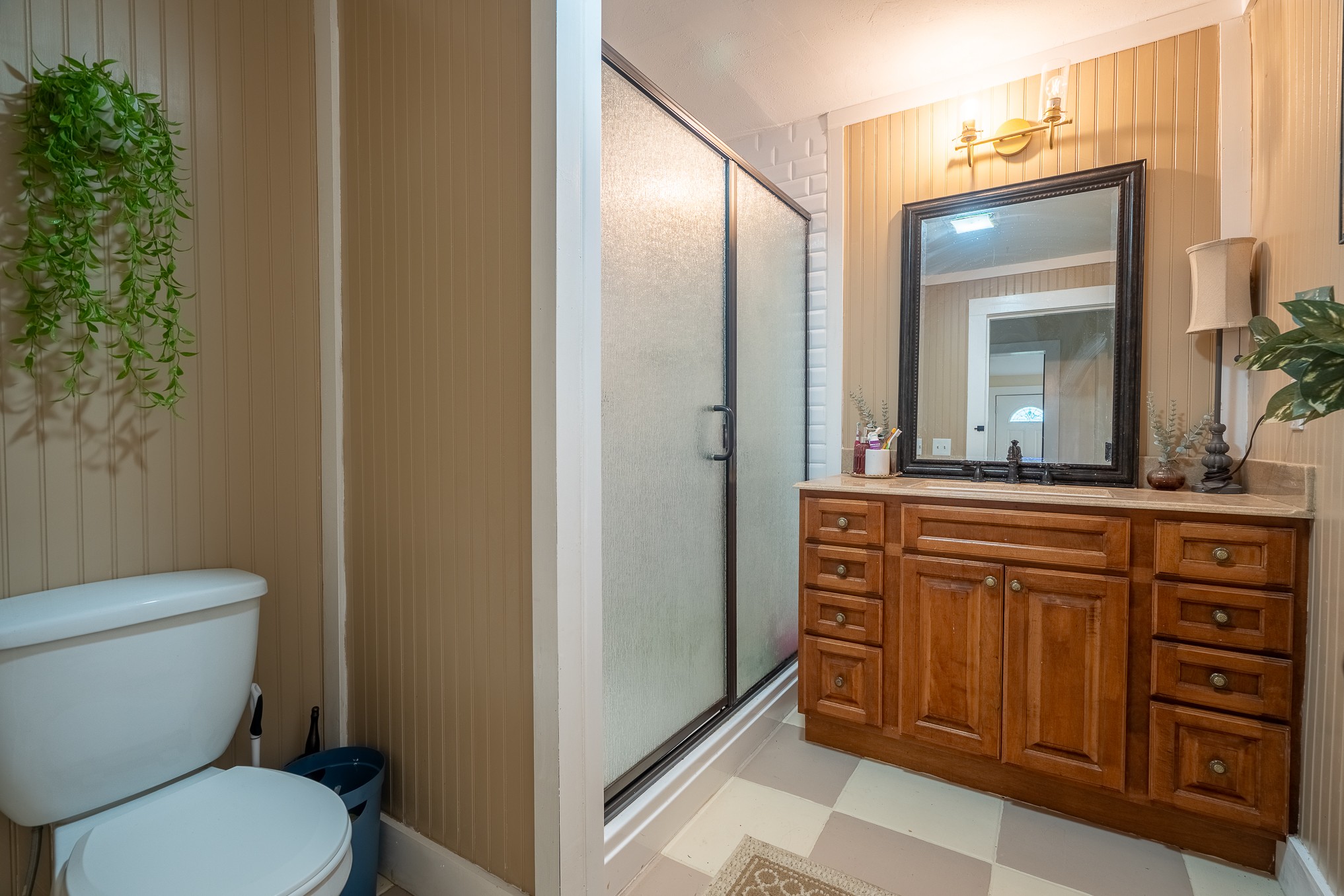 231 Rabbit Trail Road Leoma, TN 38468 - Photo 32 of 37 a bathroom with a toilet a sink and mirror