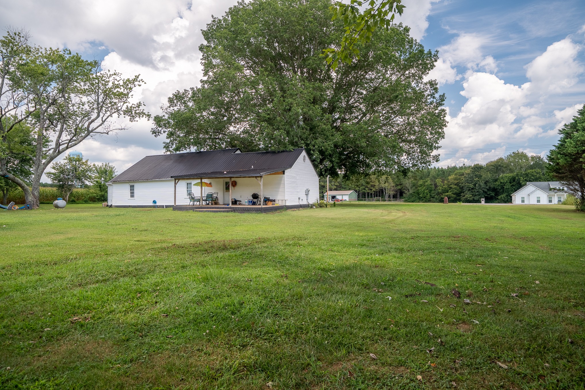 231 Rabbit Trail Road Leoma, TN 38468 - Photo 7 of 37 a front view of house with garden