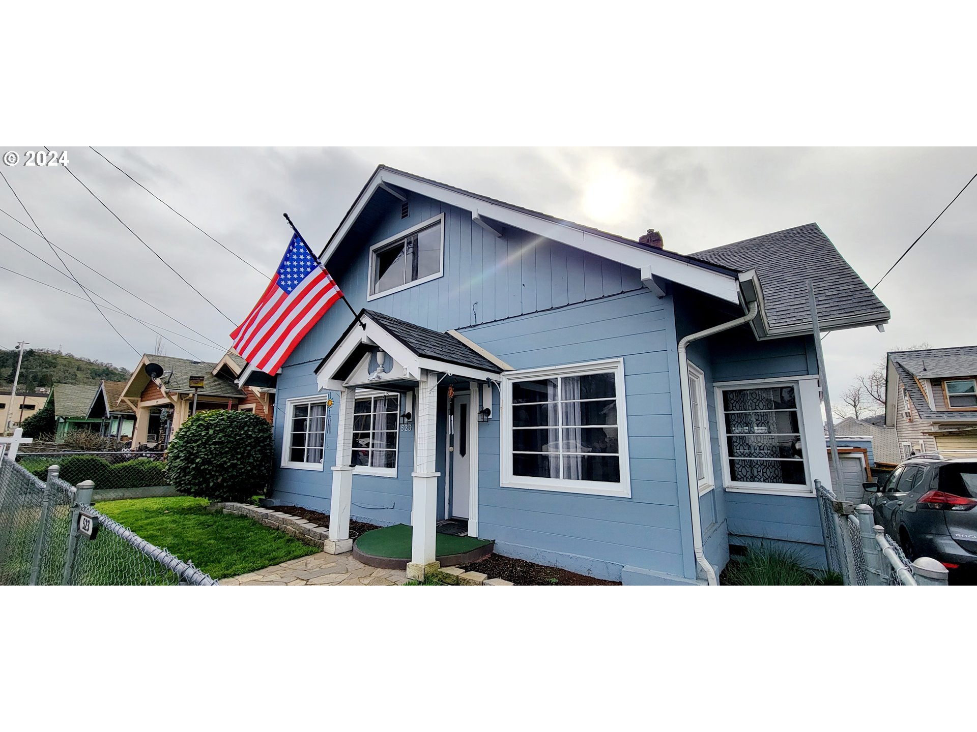 a house view with a garden space