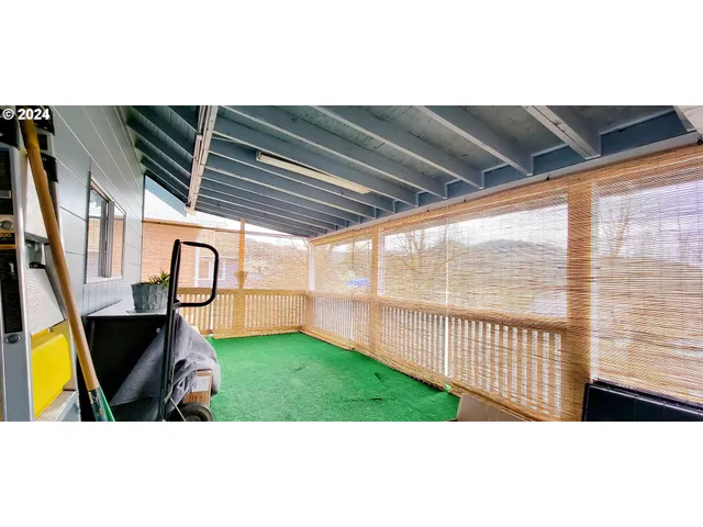 a view of house with yard