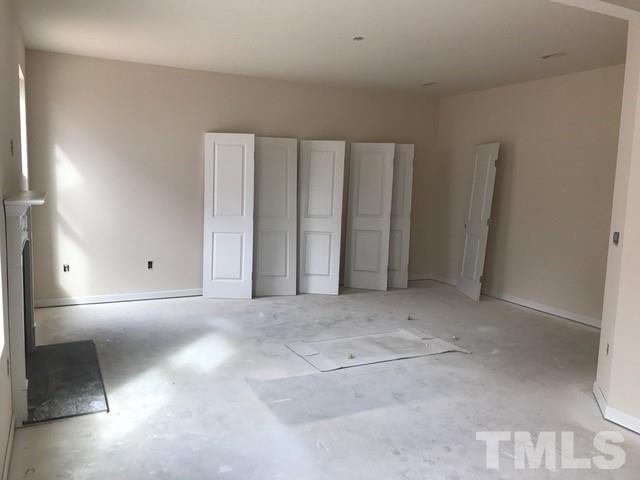Large family room with plenty of usable wall space!