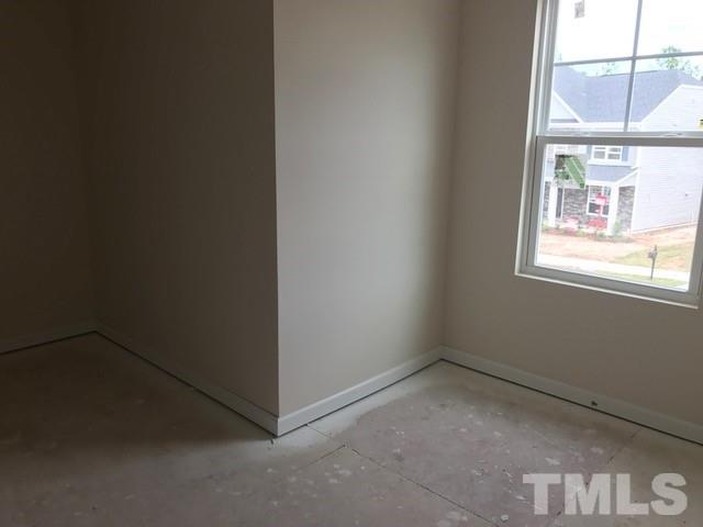 Nope, this isn't a room - it's a closet!  And only a portion of it!  The master suite has 2 very generous closets - enough to share ... or not!