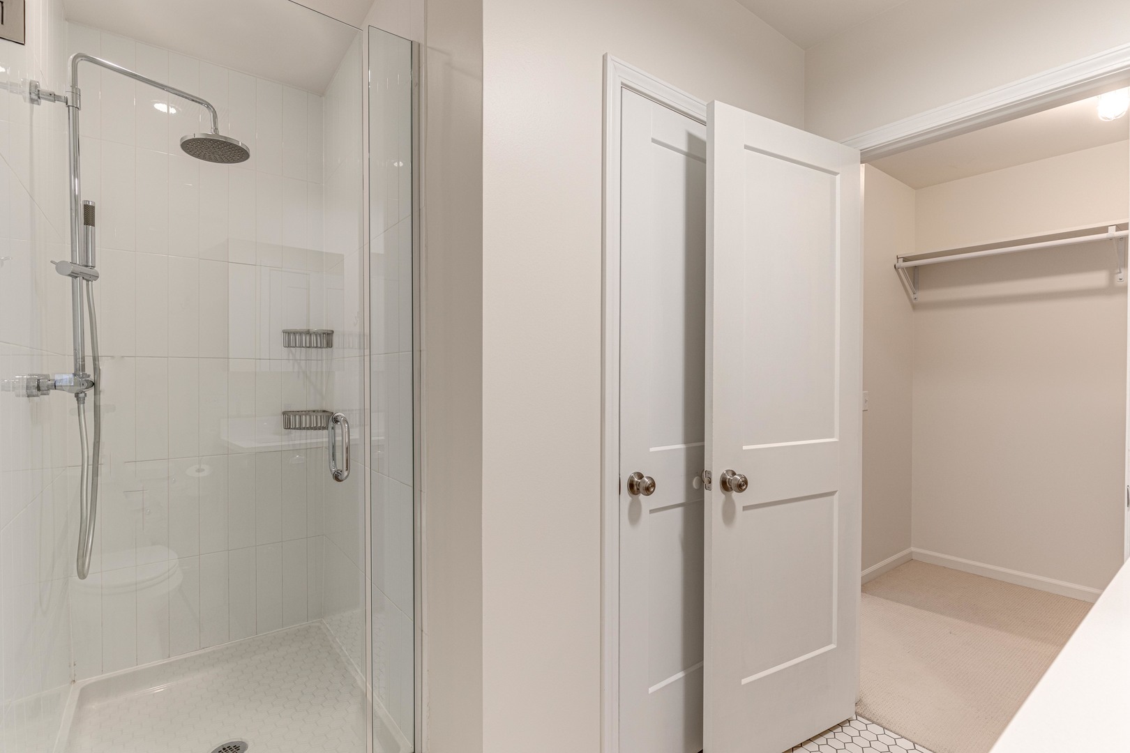 115 Lake Street, Unit 313 Libertyville, IL 60048 - Photo 8 of 10 a bathroom with a shower