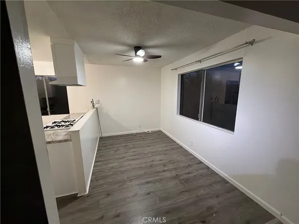 an entryway in a room with a fireplace