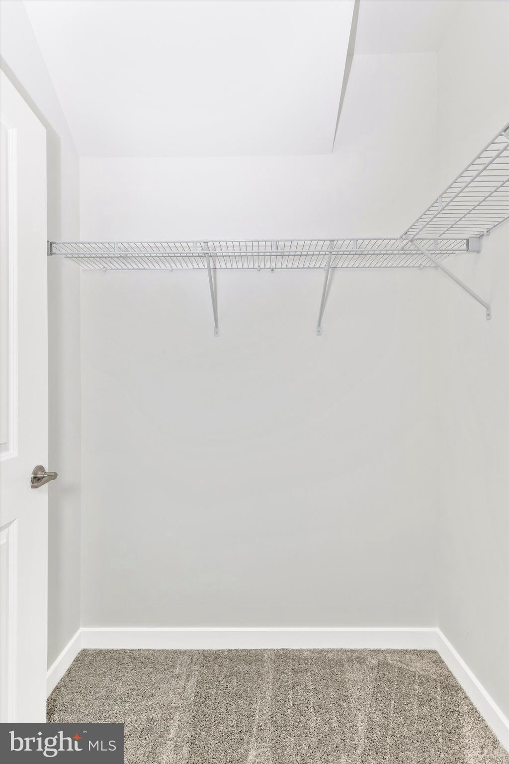 714 Iron Frg Road Frederick, MD 21702 - Photo 22 of 36 a view of small space with racks on the wall