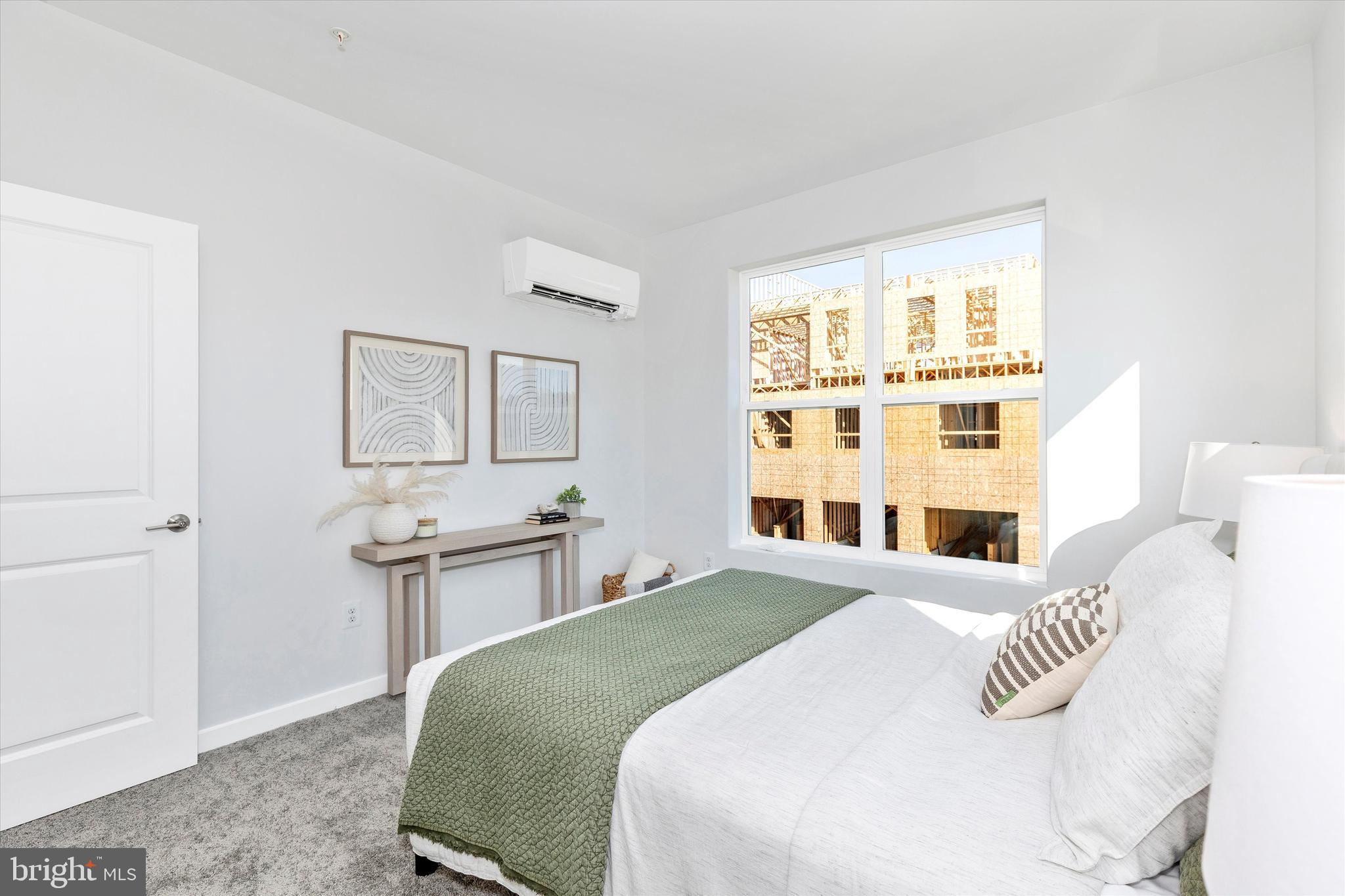 714 Iron Frg Road Frederick, MD 21702 - Photo 26 of 36 a bedroom with a bed and wooden floor