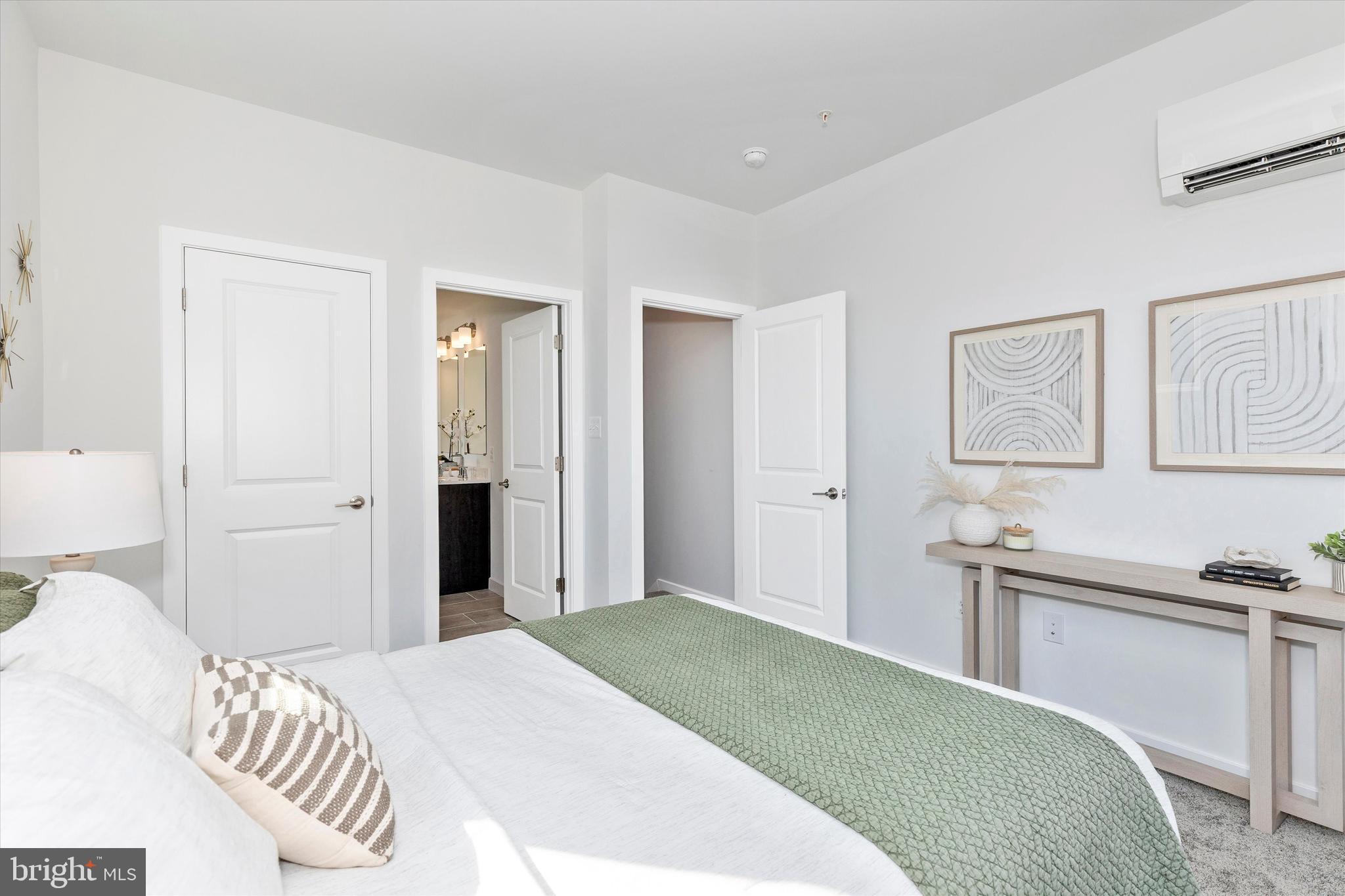 714 Iron Frg Road Frederick, MD 21702 - Photo 28 of 36 a bedroom with a bed and cabinets