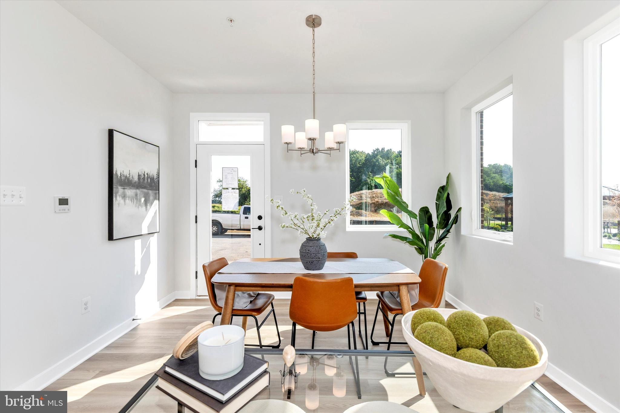714 Iron Frg Road Frederick, MD 21702 - Photo 7 of 36 a dining room with furniture and window