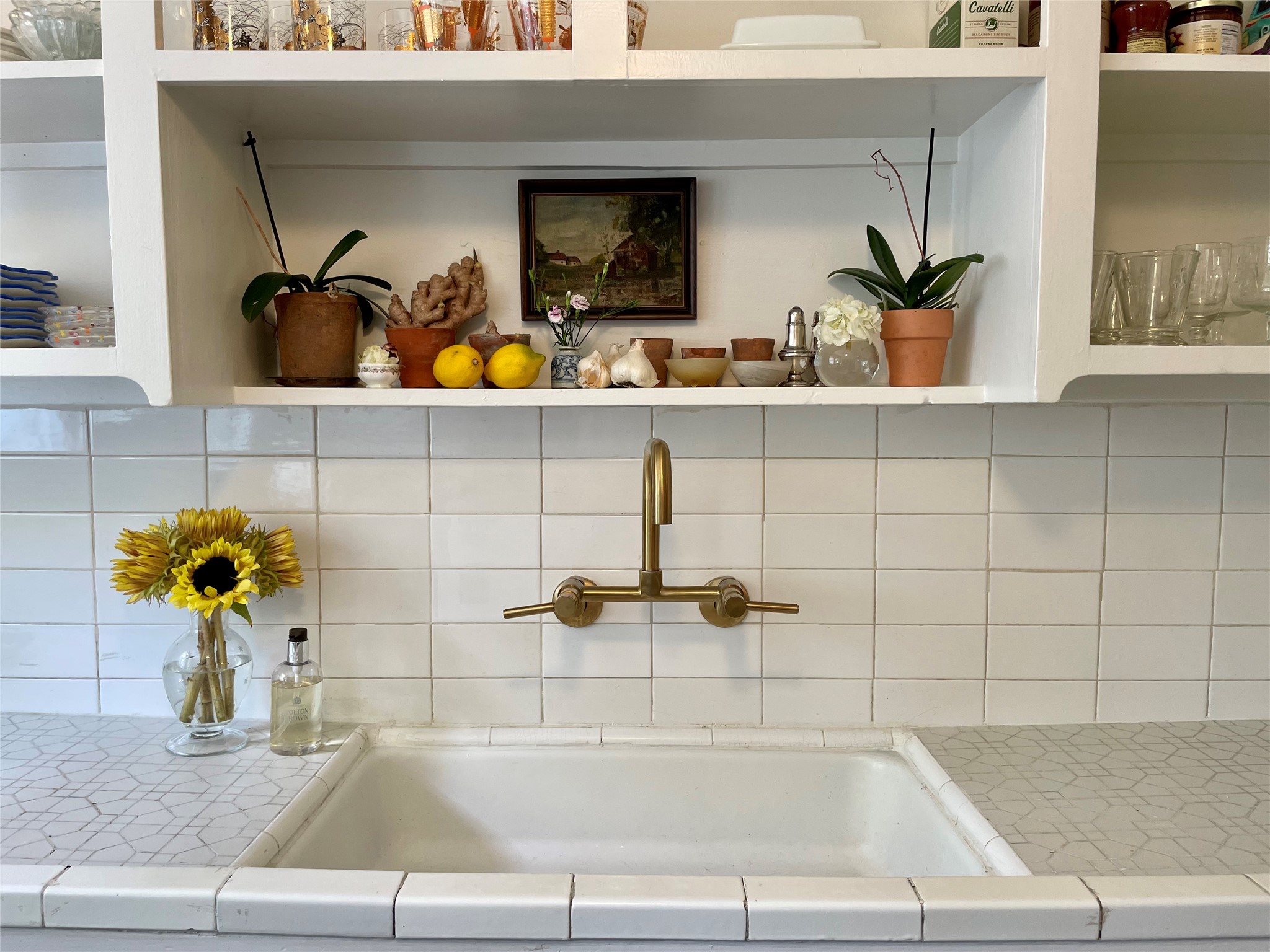 429 Hawthorne Street, Unit 2 Houston, TX 77006 - Photo 1 of 35 Adorable vintage kitchen with classic tile backsplash and brass hardware