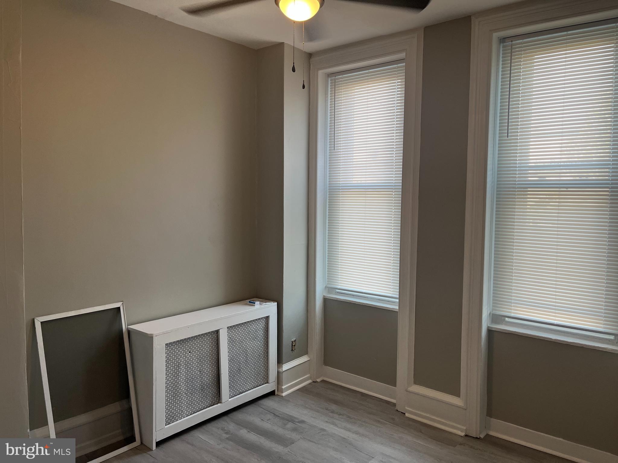 2666 Bridge Street Philadelphia, PA 19137 - Photo 14 of 25 a utility room with closet and wooden floor