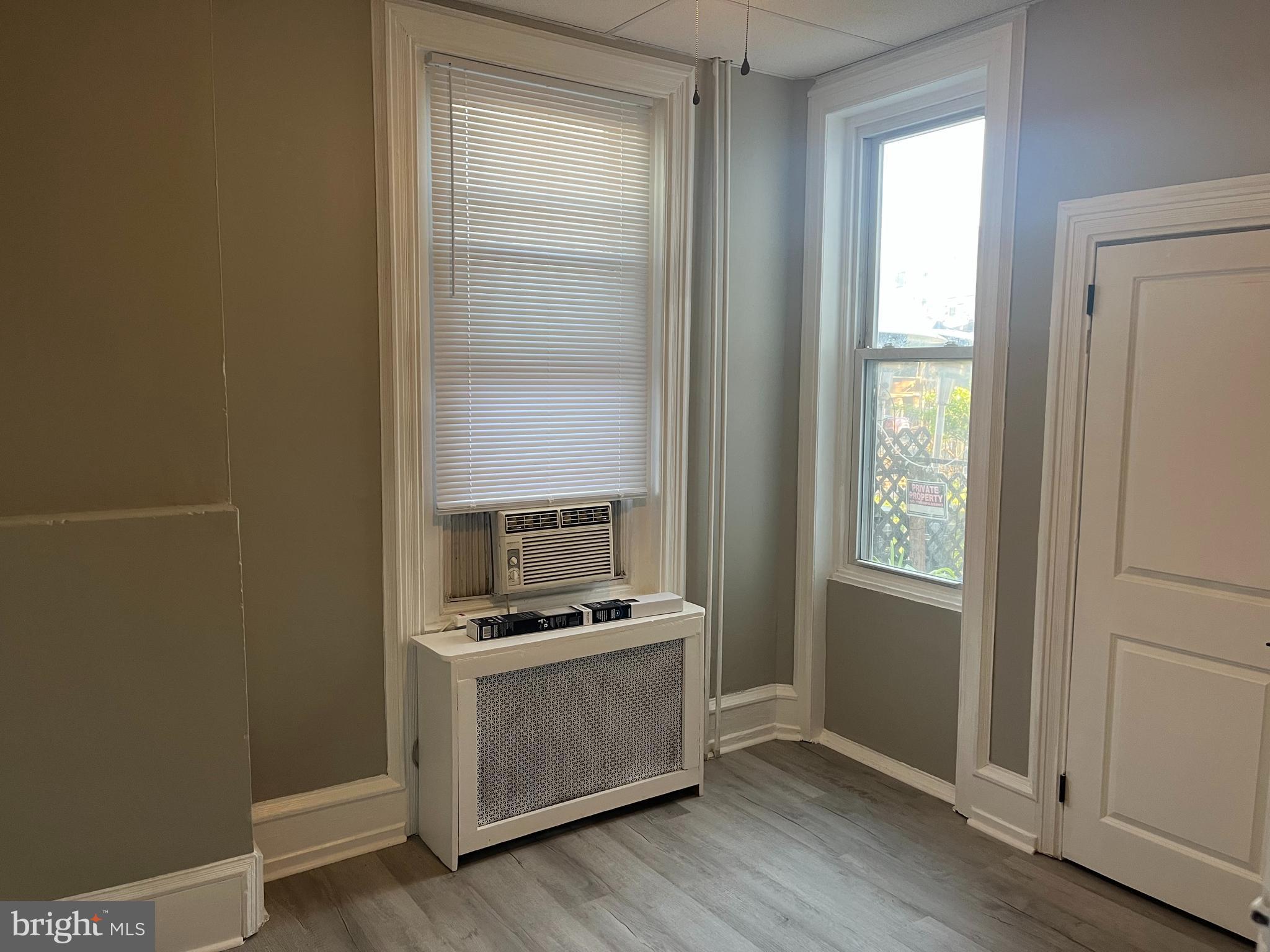 2666 Bridge Street Philadelphia, PA 19137 - Photo 17 of 25 a kitchen with a stove and wooden floor