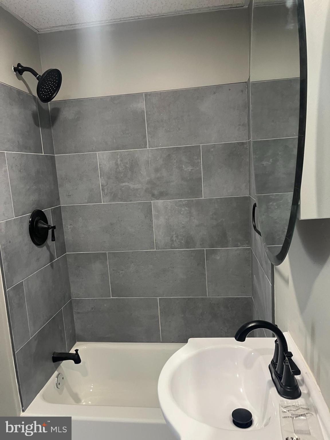 2666 Bridge Street Philadelphia, PA 19137 - Photo 7 of 25 a bathroom with a sink and a shower