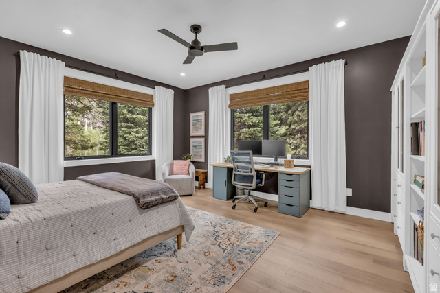 1766 West Tollgate Cyn Road Coalville, UT 84017 - Photo 13 of 59 Spacious room featuring multiple windows with natural light, recessed lighting, a ceiling fan, and wood-finish flooring