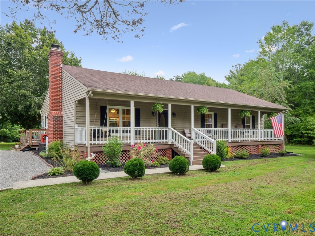 2568 Crewsville Road Bumpass, VA 23024 - Photo 1 of 30 front view of a house with a yard