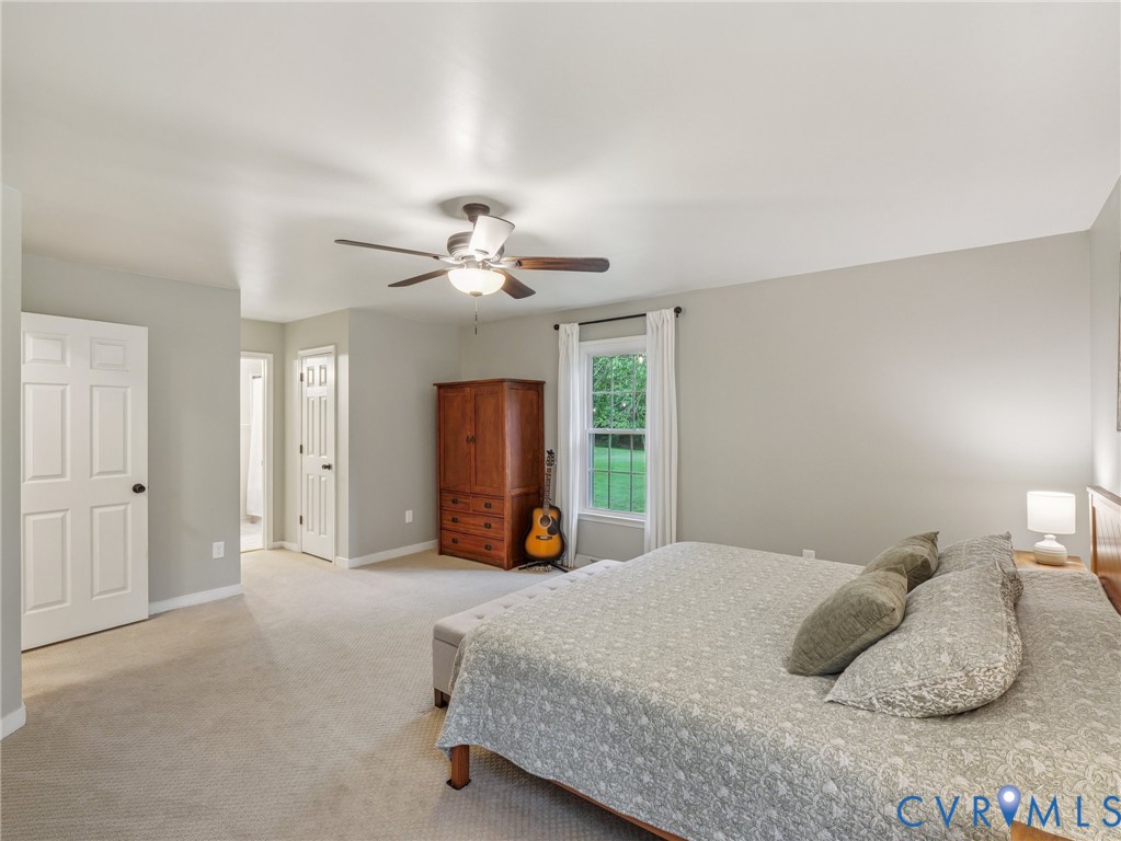 2568 Crewsville Road Bumpass, VA 23024 - Photo 18 of 30 a bedroom with a bed and window