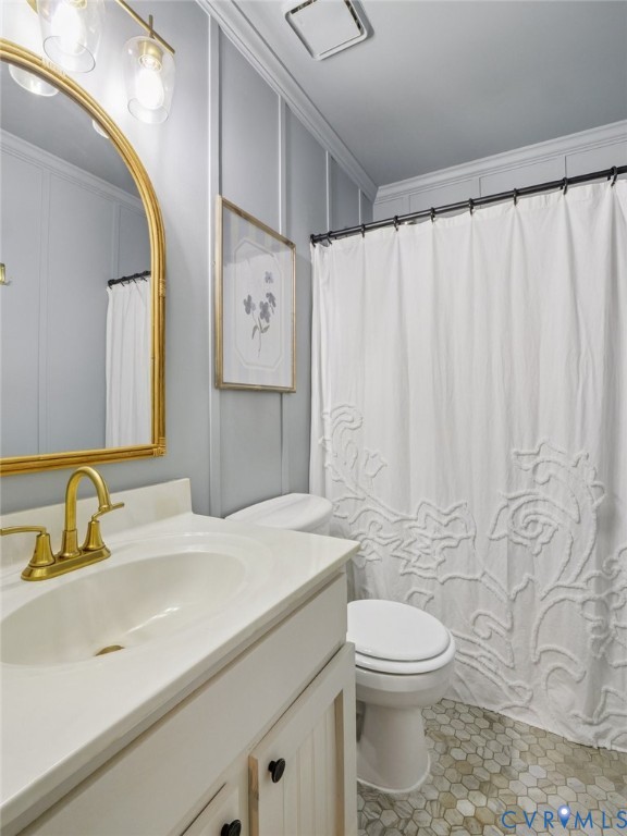 2568 Crewsville Road Bumpass, VA 23024 - Photo 23 of 30 a bathroom with a toilet sink and mirror
