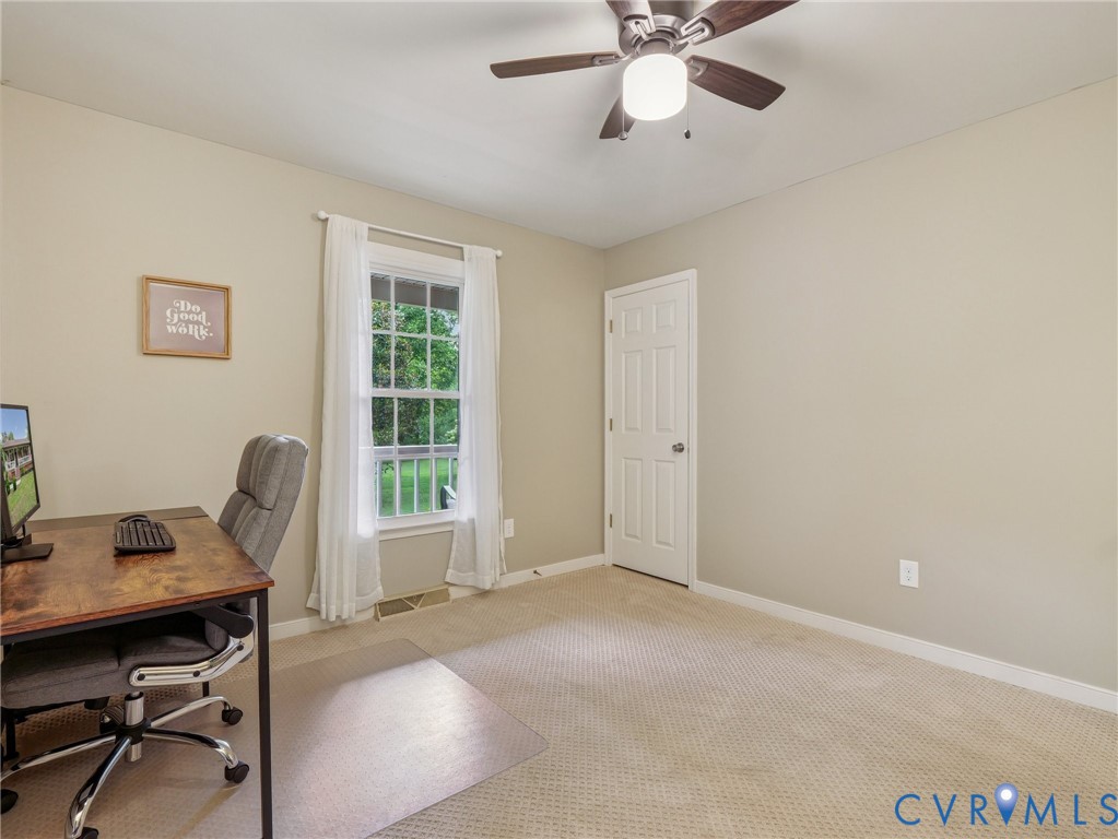 2568 Crewsville Road Bumpass, VA 23024 - Photo 26 of 30 a workspace with chandelier