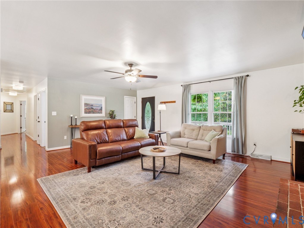 2568 Crewsville Road Bumpass, VA 23024 - Photo 7 of 30 a living room with furniture and a large window
