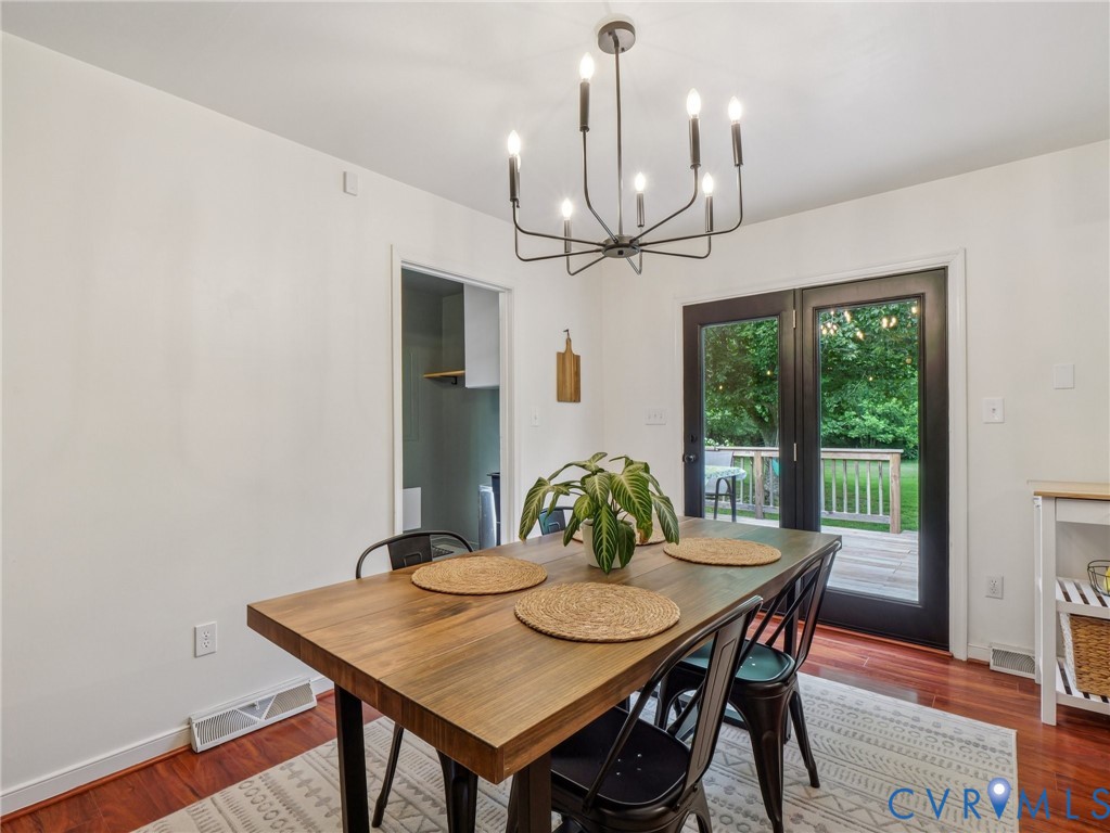 2568 Crewsville Road Bumpass, VA 23024 - Photo 10 of 30 a view of a dining room with furniture window and wooden floor