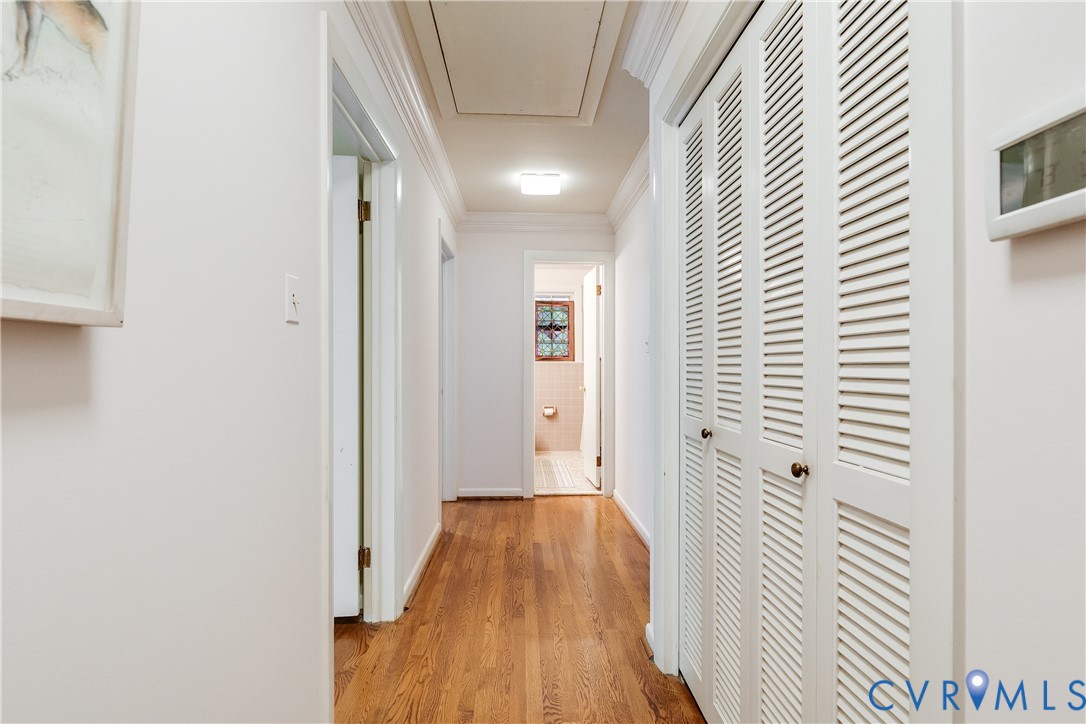 10475 Cherokee Road Richmond, VA 23235 - Photo 71 of 74 Hallway featuring wood-finish flooring, white wall