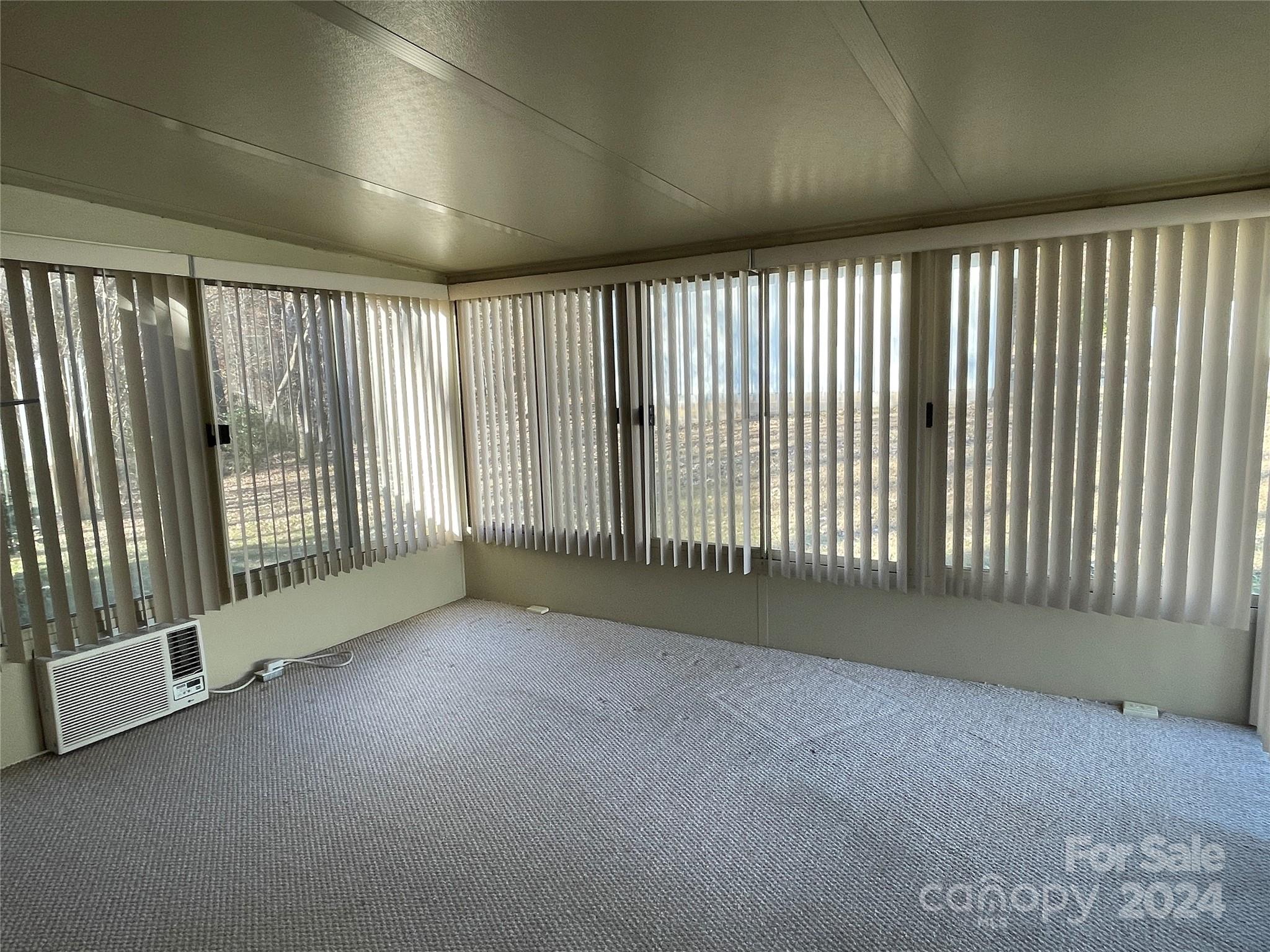 228 Shadowbrook Road Stanley, NC 28164 - Photo 19 of 44 a view of an empty room with a window