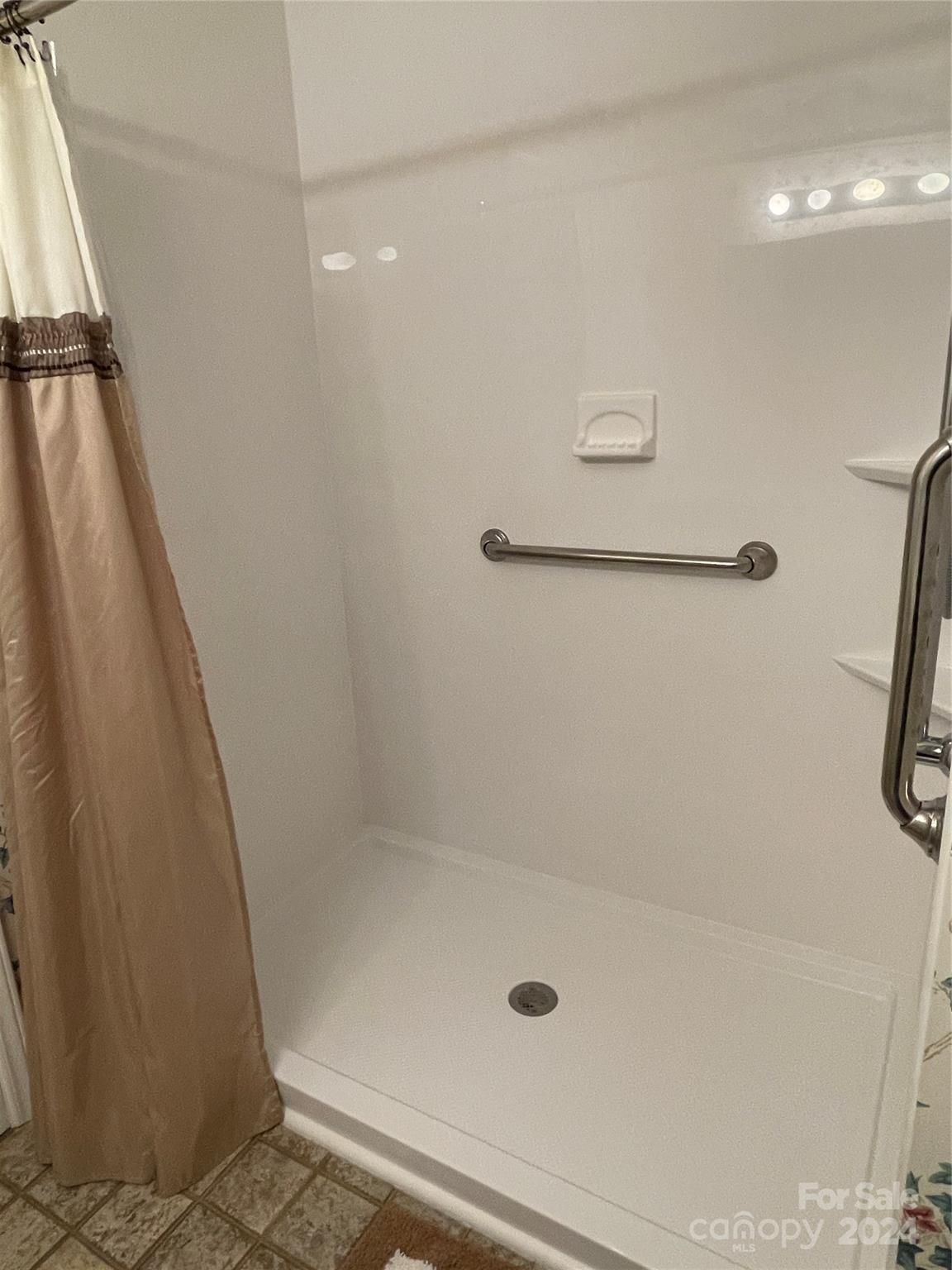 228 Shadowbrook Road Stanley, NC 28164 - Photo 34 of 44 a bathroom with a shower