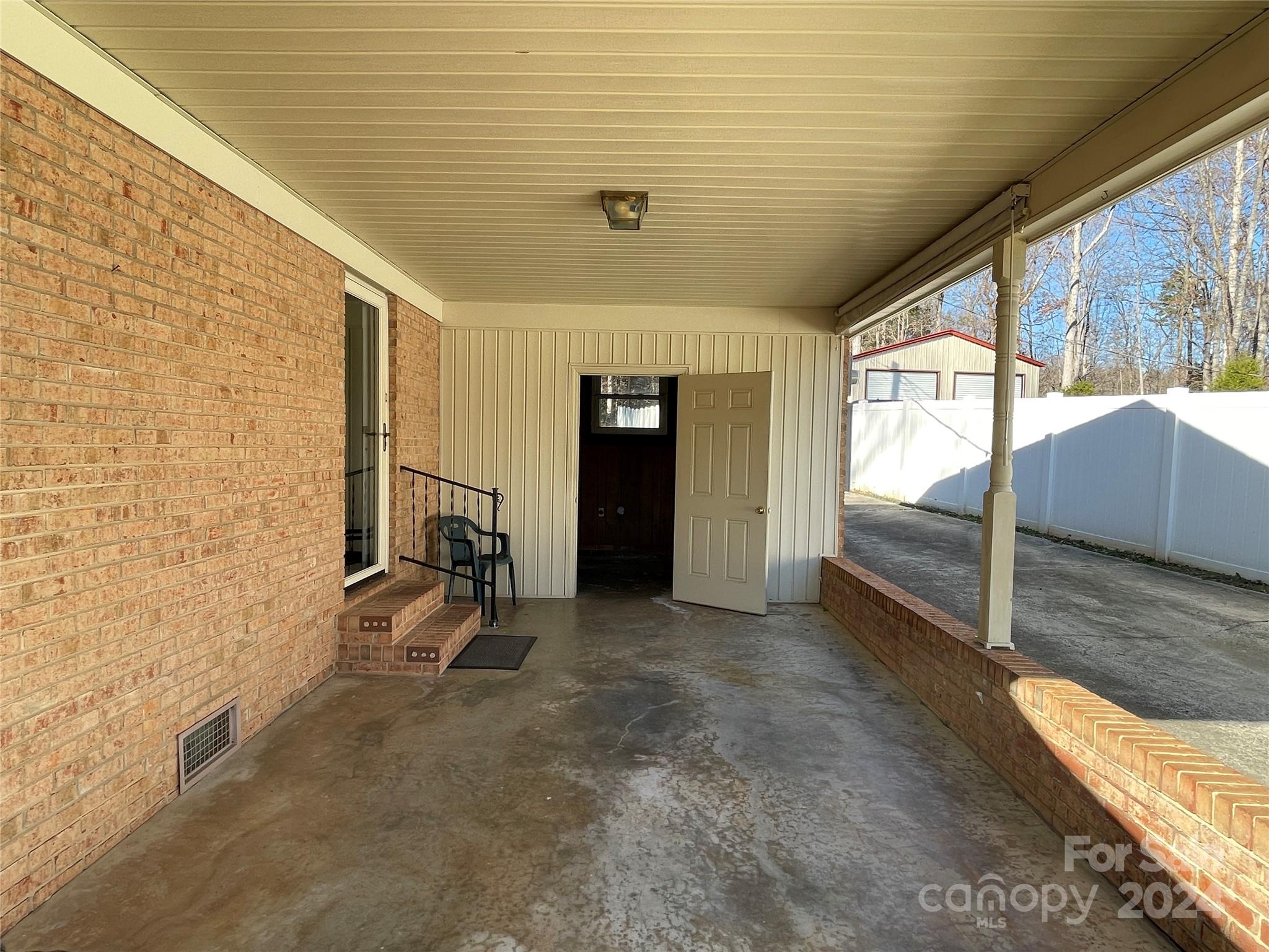 228 Shadowbrook Road Stanley, NC 28164 - Photo 36 of 44 a view of a livingroom with wooden floor and furniture