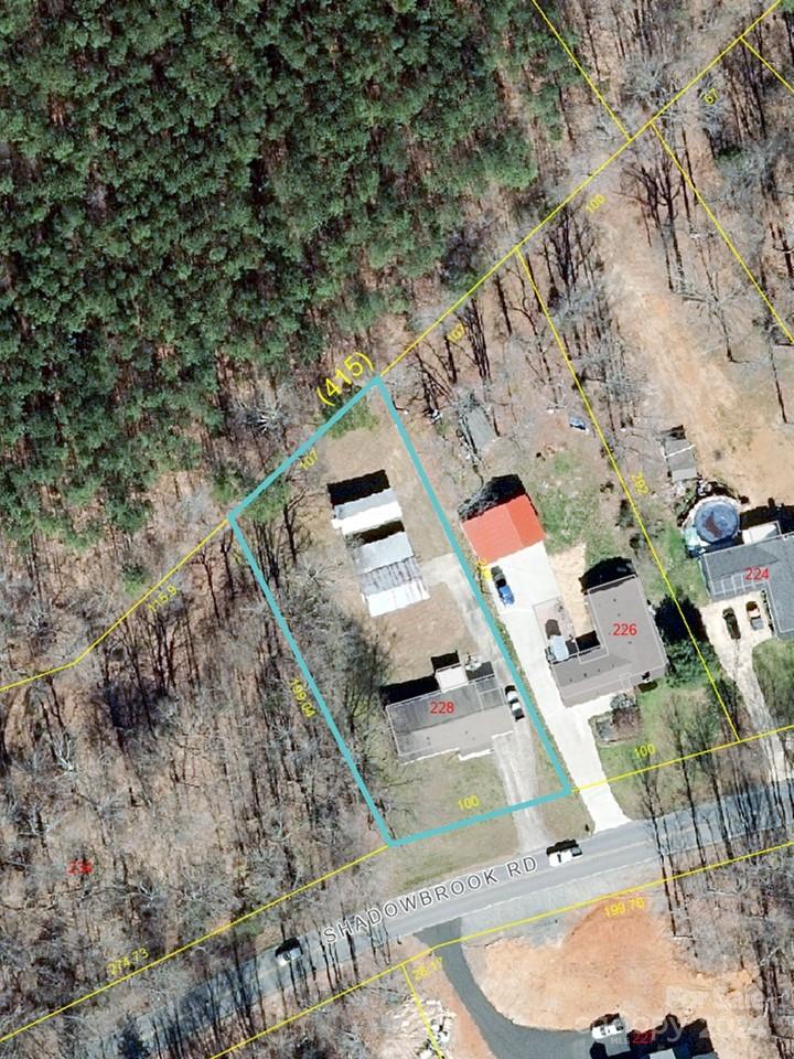 228 Shadowbrook Road Stanley, NC 28164 - Photo 44 of 44 an aerial view of a house with a yard